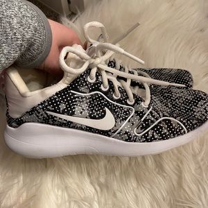 Black and white speckled Nike’s